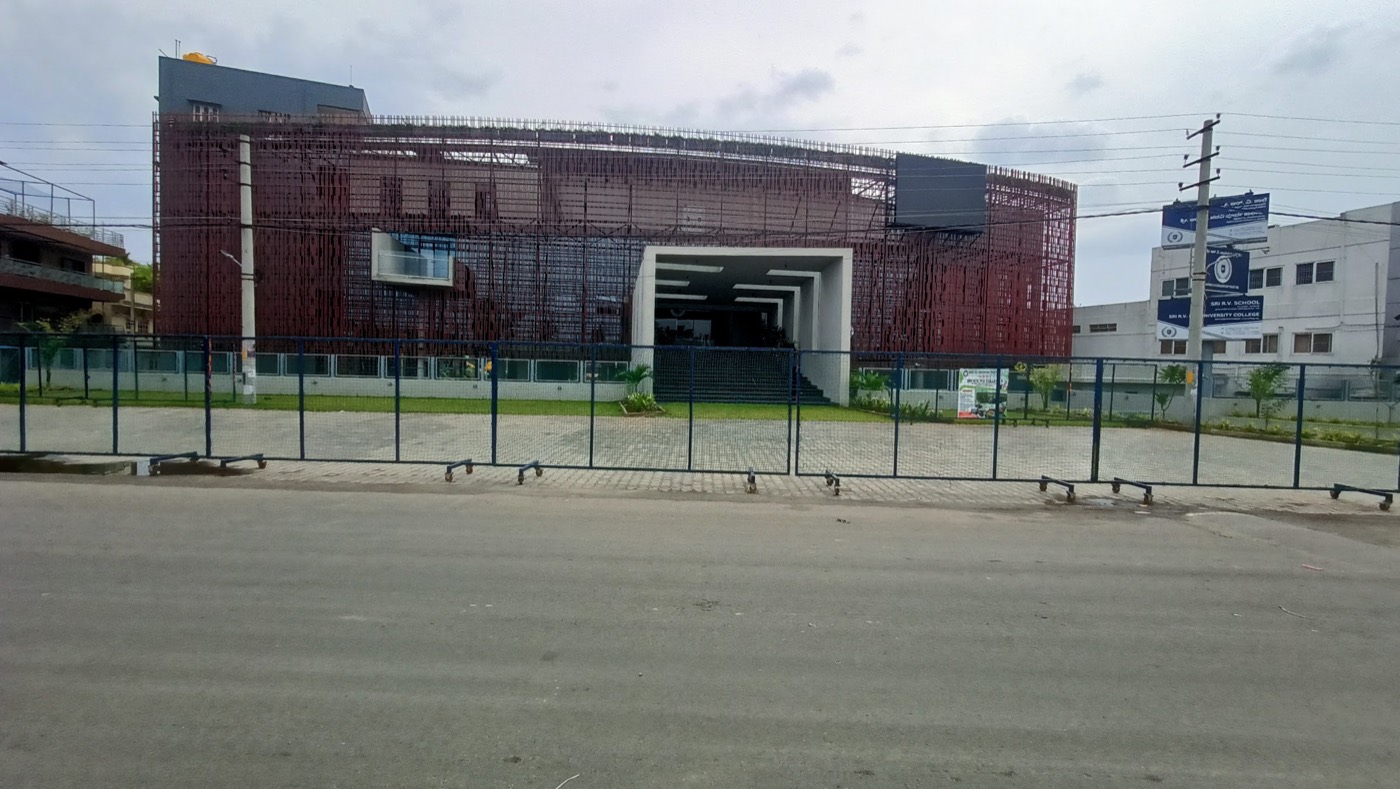 The Sri R.V. PU College building seen from the NH-75 bypass road